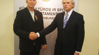 Treneris įvertintas už rankinio plėtrą